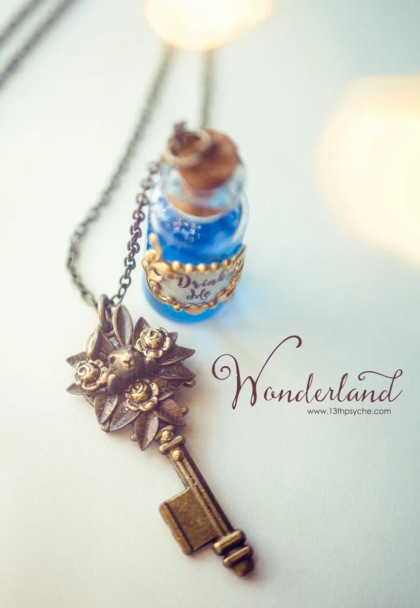 Alice in Wonderland Drink me potion bottle necklace