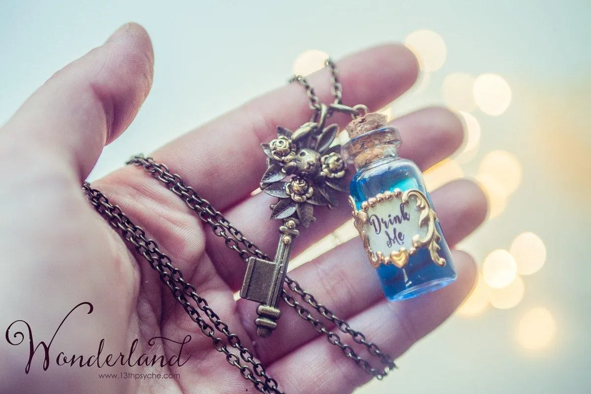 Alice in Wonderland Drink me potion bottle necklace